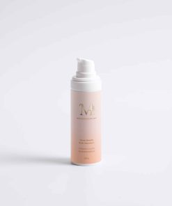 Flacon du Sérum Booster Éclat Vitamine C Mimiastou-Glow-Skin sur fond blanc pour un teint lumineux.