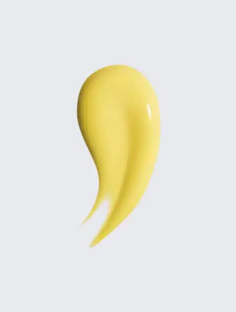 Gros plan sur la texture fluide et lumineuse du Sérum Booster Éclat Vitamine C Mimiastou-Glow-Skin.
